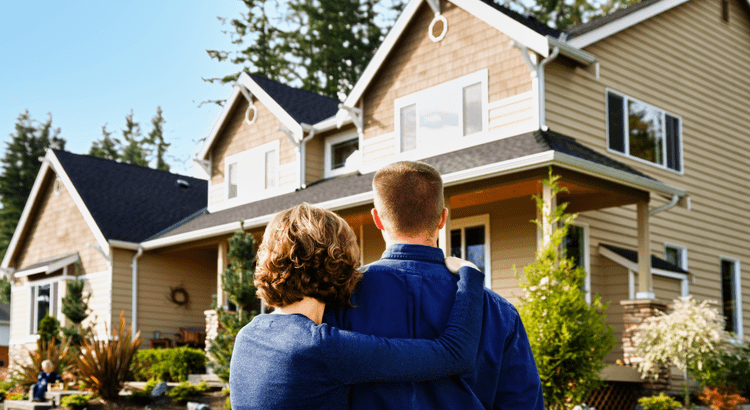 A first homebuyer couple looking at a home for sale in Tallahassee, Florida real estate.